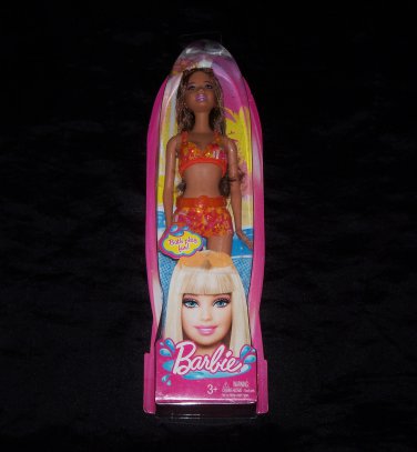 orange barbie doll