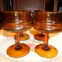 4 Amber Wine/Champagne  stemmed glasses in very good condition, no visible defects.