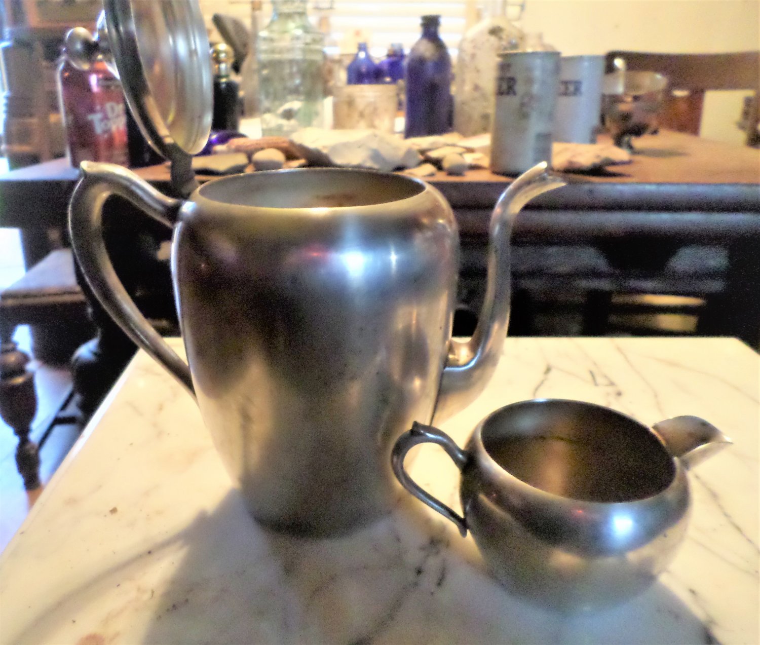 Antique Silverplated F B Rodgers Coffee/Teapot with matching creamer. 1800s