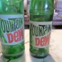 2 Vintage 1970s Mountain Dew soda bottles. one 16oz., one 10oz. Collectible