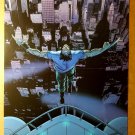 Wolverine Logan Jumping from building Marvel Comics Poster by John Cassady Wolverine Logan Jumping from building Marvel Comics Poster by John Cassady