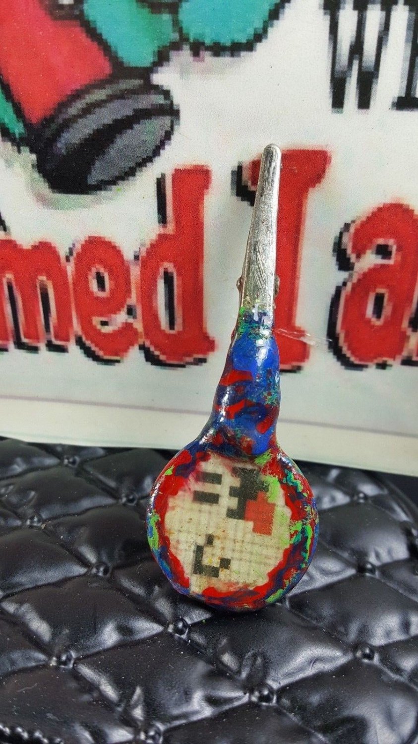 Super Mario and other side is Boo incense holder, weed,tobacco roach clip
