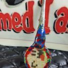Super Mario and other side is Boo incense holder, weed,tobacco roach clip