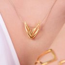 sWINGS Sharp, Pendant with chain. 18k Gold Plated Brass.