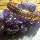 Solid Copper Bangle 784- 5/16 Of An Inch wide. Will fit a 7 To 71/2 inch wrists. Solid Copper Bangle 784- 5/16 Of An Inch wide. Will fit a 7 To 71/2 inch wrists.
