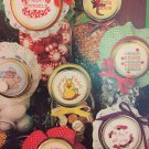 Leisure Arts leaflet 211 Jar Lids for counted cross stitch