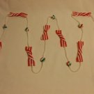 Red And White And Green Plastic Christmas Bows 72 Inches Long