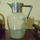 vintage WMF jugs pitchers Silverplate and glass.