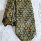 GUCCI .  tie original.  100 % Silk  Golden and green  color
