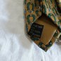 GUCCI .  tie original.  100 % Silk  Golden and green  color