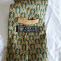GUCCI .  tie original.  100 % Silk  Golden and green  color