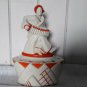 art deco figure for flowers, ceramic in beige and orange colors
