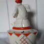 art deco figure for flowers, ceramic in beige and orange colors