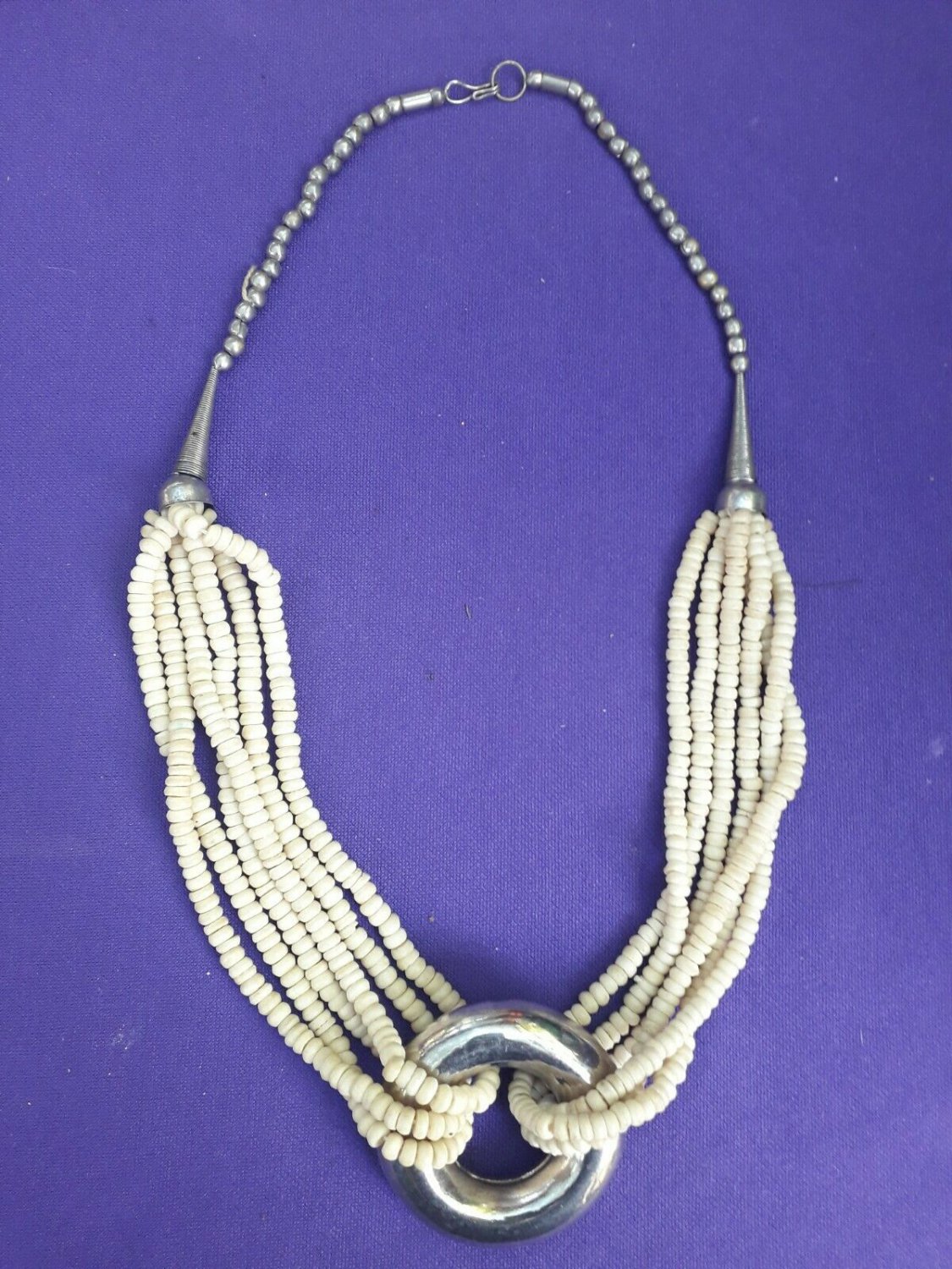 VINTAGE old art deco carved cow bone and metal necklace