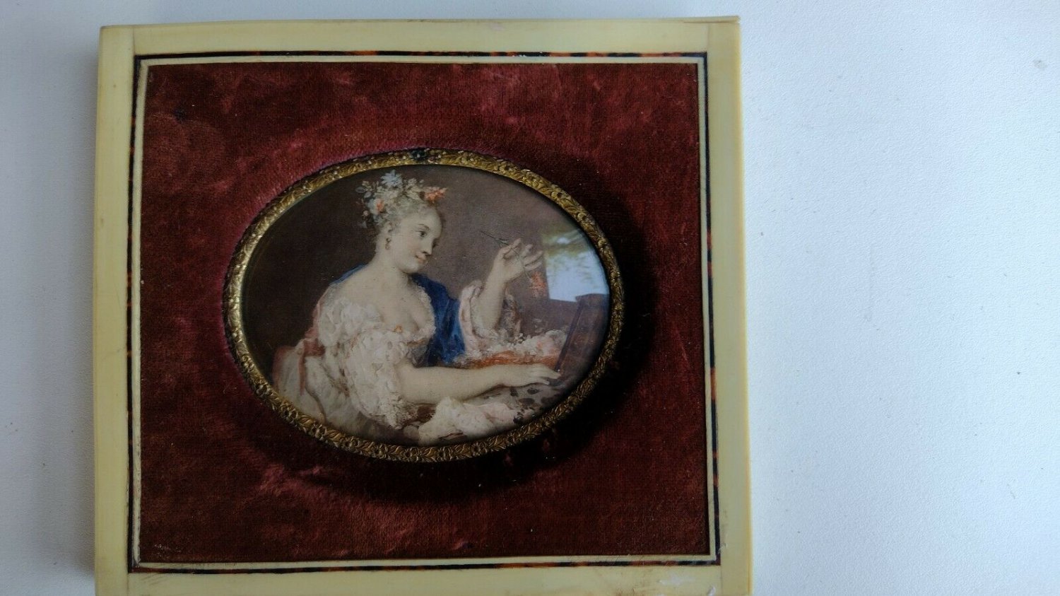 old miniature print engraving framed in a celluloid frame