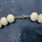 old  vintage pearl necklace, galalith imitating ivor. mimics her weft. so cute