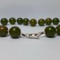 vintage old Bakelite necklace . green marble color