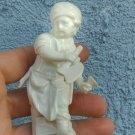 old small German white porcelain figurine brand KPM represents child with an ax