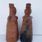 pair rustic clay candlesticks north Argentina with breakdowns