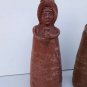 pair rustic clay candlesticks north Argentina with breakdowns