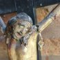 Antique old Jesus Christ on wooden cross. polychrome paper mache. breaks