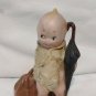 Old ANTIQUE PORCELAIN "KEWPIE" - with umbrell miniature
