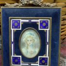 Antique old  hand painted lady portrait .with  frame and blue enamel
