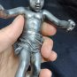 old silver metal boy figure with marble base