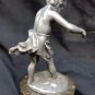 old silver metal boy figure with marble base