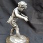 old silver metal boy figure with marble base