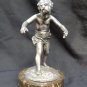 old silver metal boy figure with marble base