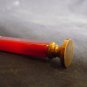 vintage bakelite seal  art deco red color and beige