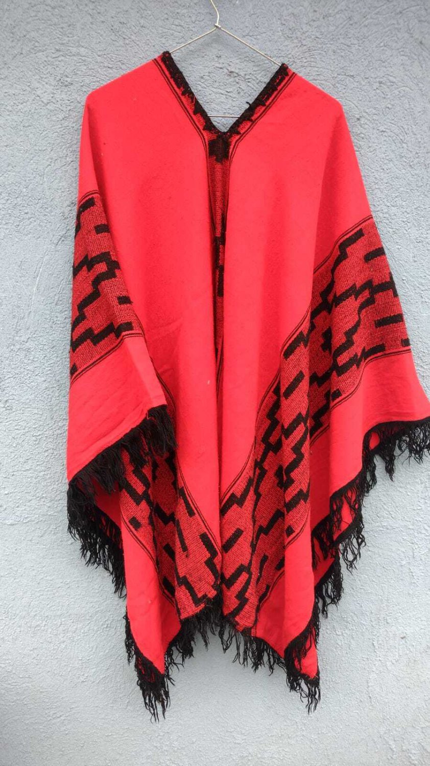 old red poncho cape typical Argentine gaucho, from the north of ...