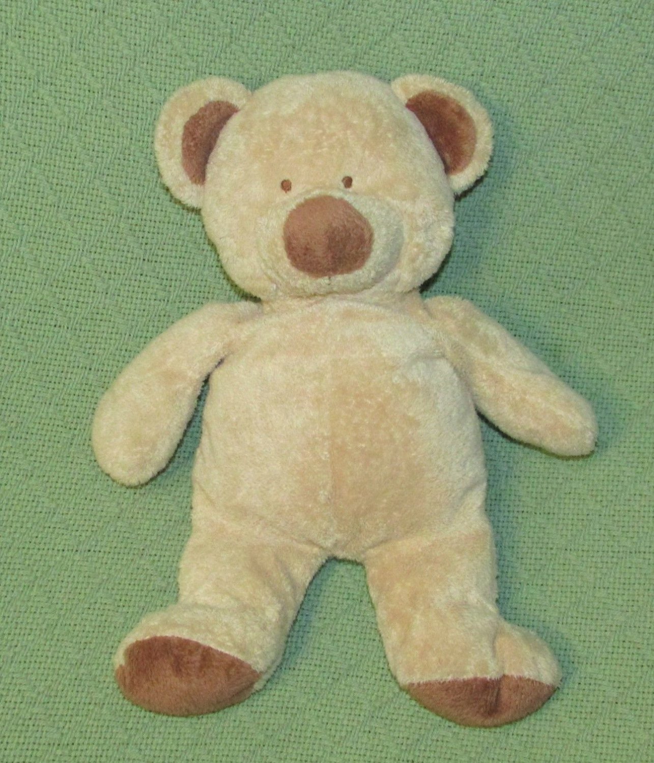 teddy bear with stitched eyes