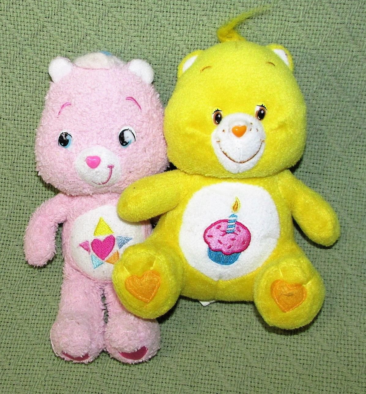 small stuffed care bears