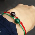 The Root Chakra balancing red cord bracelet