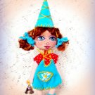 Collectible textile doll.