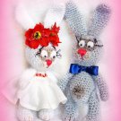 Sweet couple. Wonderful knitted bunnies.
