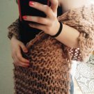 Loose knit pastel pink shawl