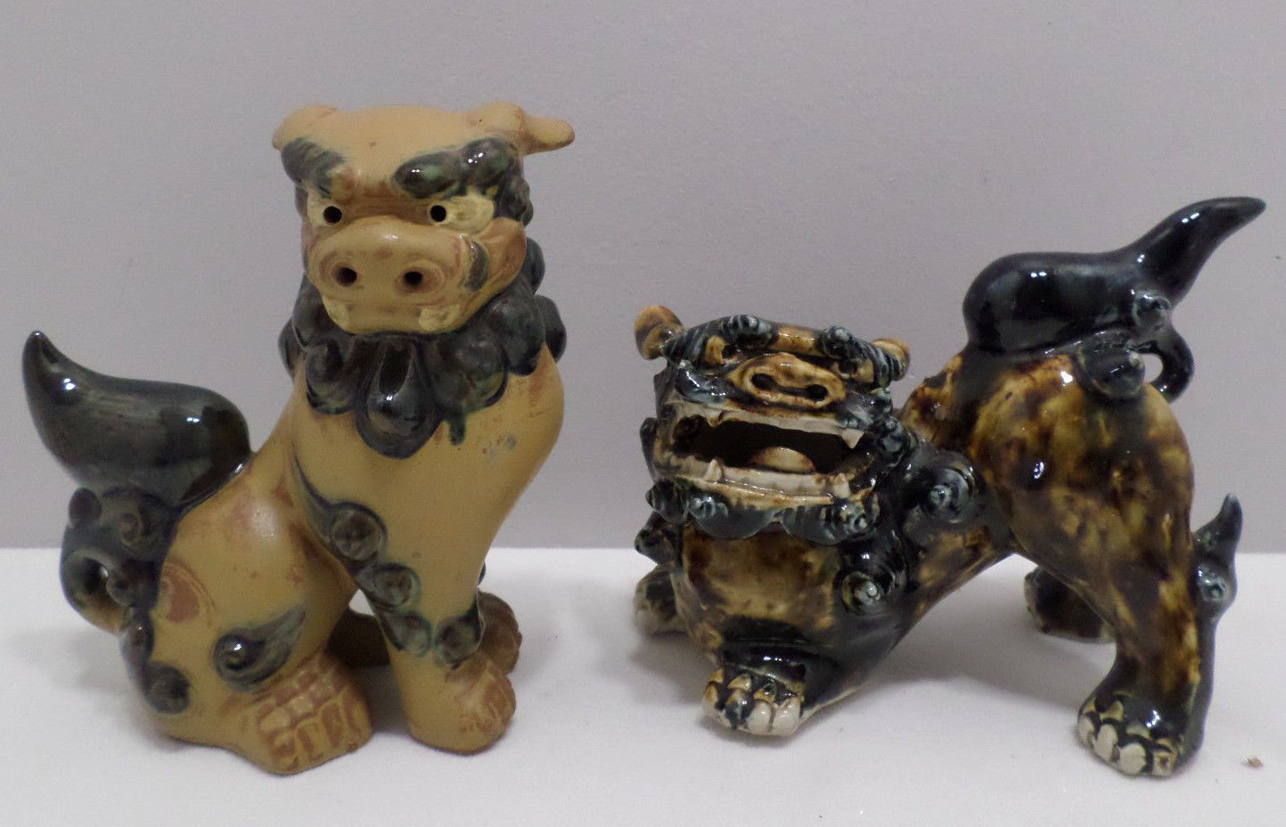 Chinese Foo Foo Dog Statues Fine Pottery and Porcelain