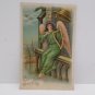 Antique Easter Postcard Angel wearing Green with Pink Wings Playing Harp