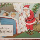 Christmas postcard Santa Claus children sleeping embossed Unposted Divided
