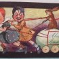 1906 Easter Postcard Children Pulling Rabbit on Egg Tuck & Sons Posted Divided