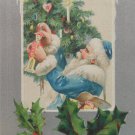 Christmas Postcard Santa Claus Dressed in Blue Embossed Posted Divided