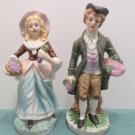 Antique figurines Bisque Man and a Woman with Baskets of Grapes