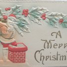 Antique Christmas Postcard Santa Claus Climbing Down Chimney Embossed Posted