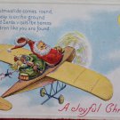 Christmas Postcard Santa Claus Delivering Toys in an Airplane Three Postcards