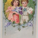 Antique Postcard Little Girl and Boy Gemany Glossy Posted Divided