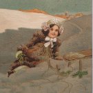 Antique Christmas postcard little girl Germany embossed unposted