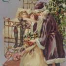 Antique Christmas Postcard Santa Claus Wearing Purple Embossed Divided Posted